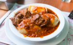 The sorrentinos are an Argentinan specialty. They're similar to ravioles, only larger and filled in with white cheese and ham.